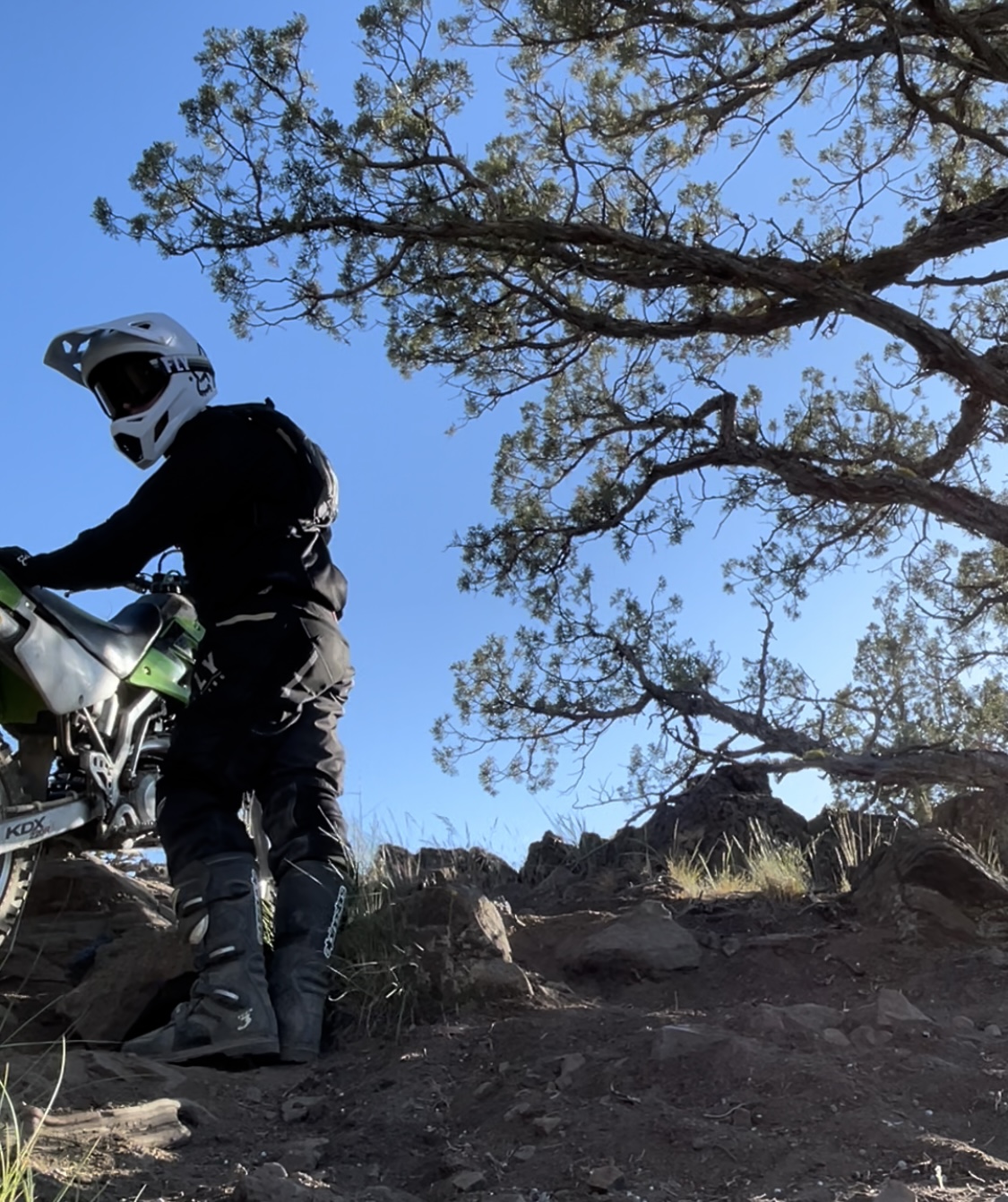 Someone next to a dirt bike